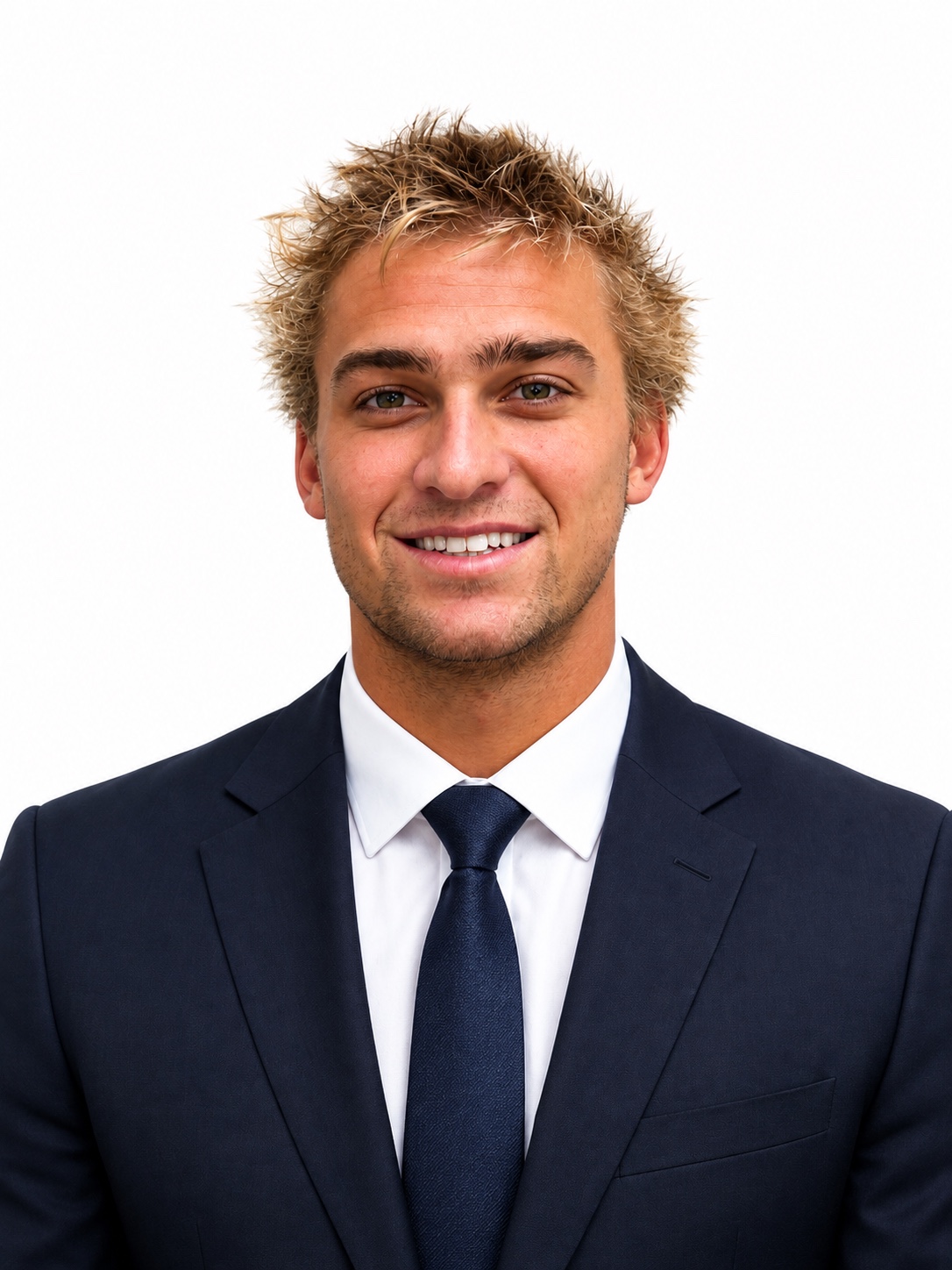 Cane Lige, founder of CJL Construction & Management, wearing a navy suit
